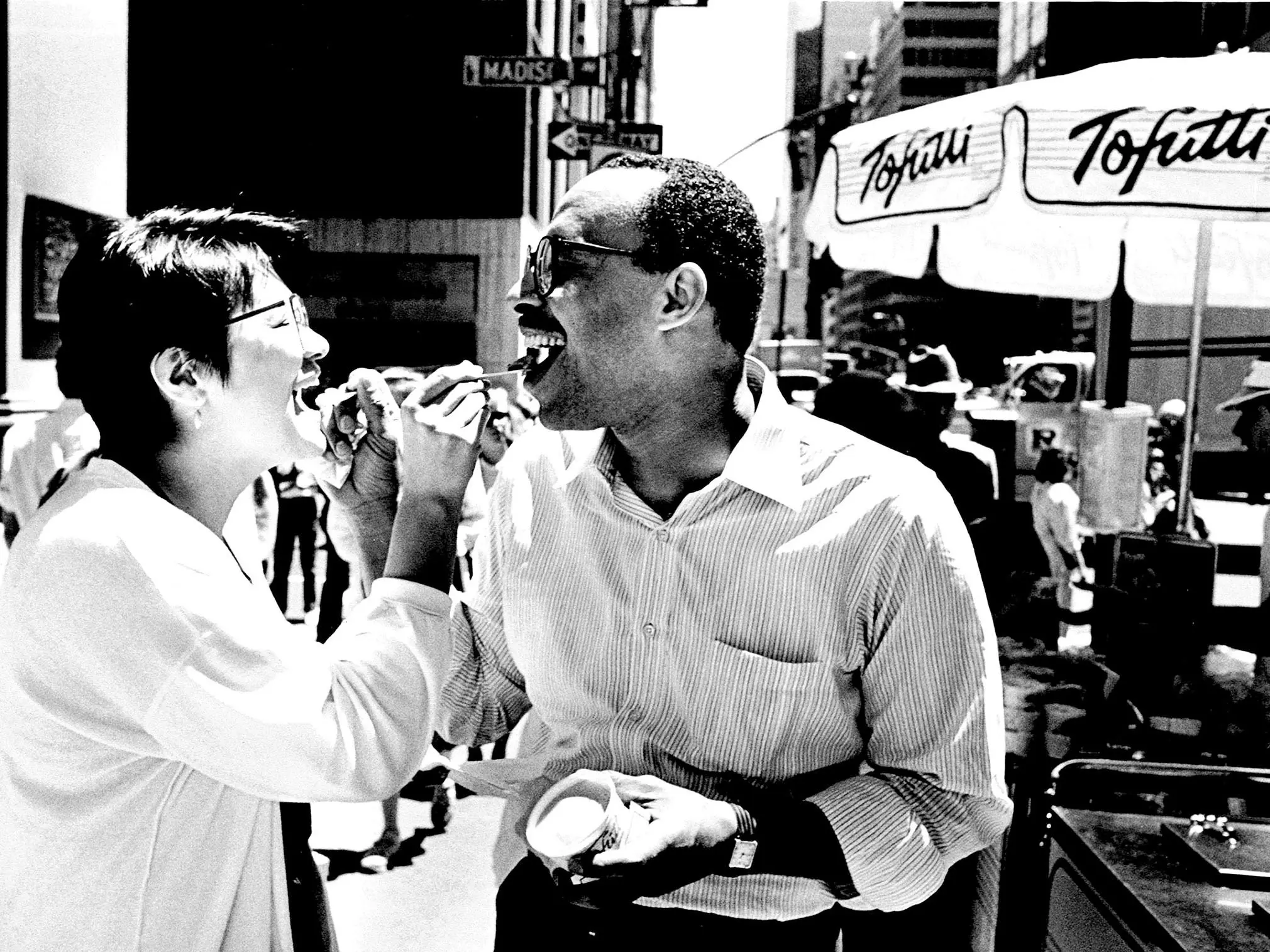 Two people are eating Tofutti
